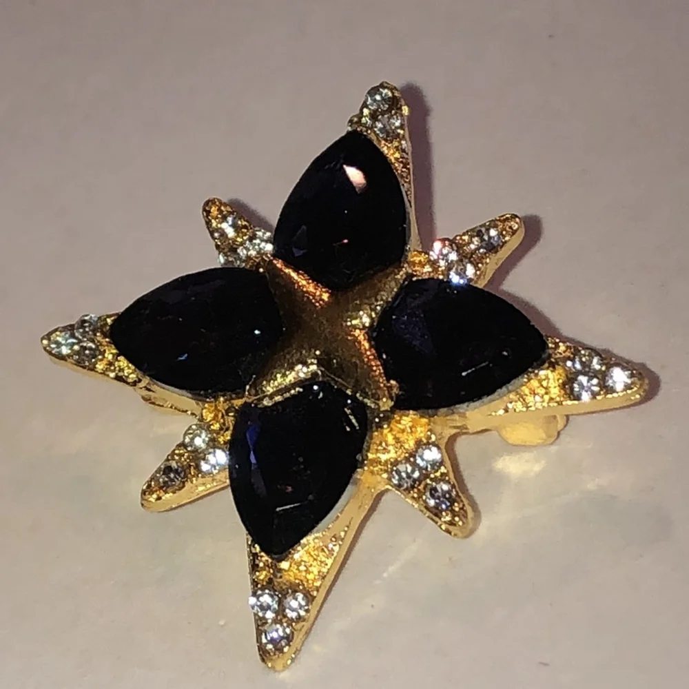 Elegant Gold Tone Purple Starburst Brooch